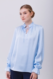 Блузка голубая с рюшей